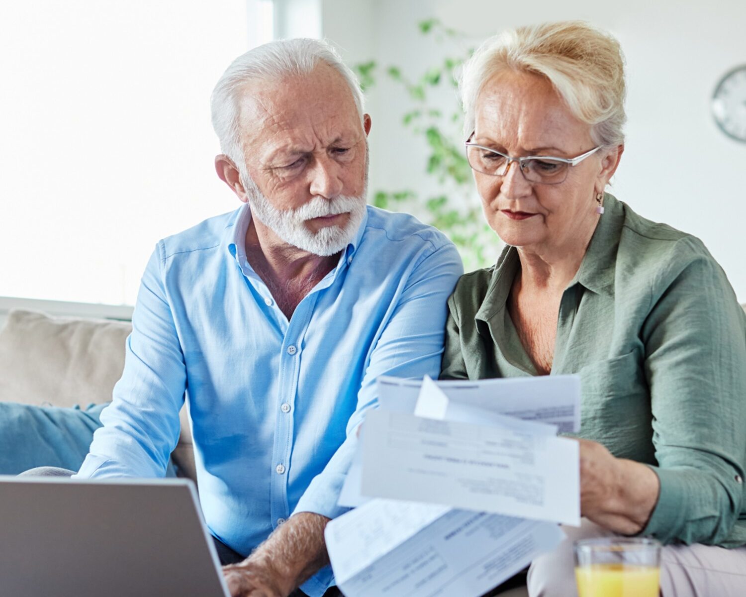 A senior couple reviewing documents